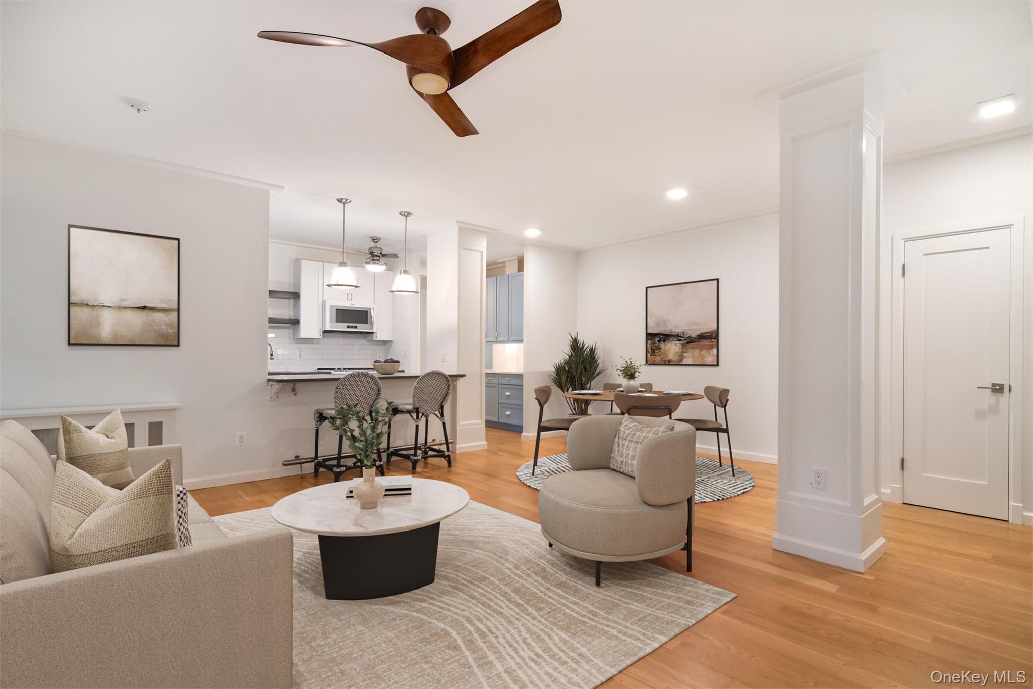 56 Pondfield Road West, Unit 1A Bronxville, NY 10708 - Photo 1 of 1 a living room with furniture and white walls