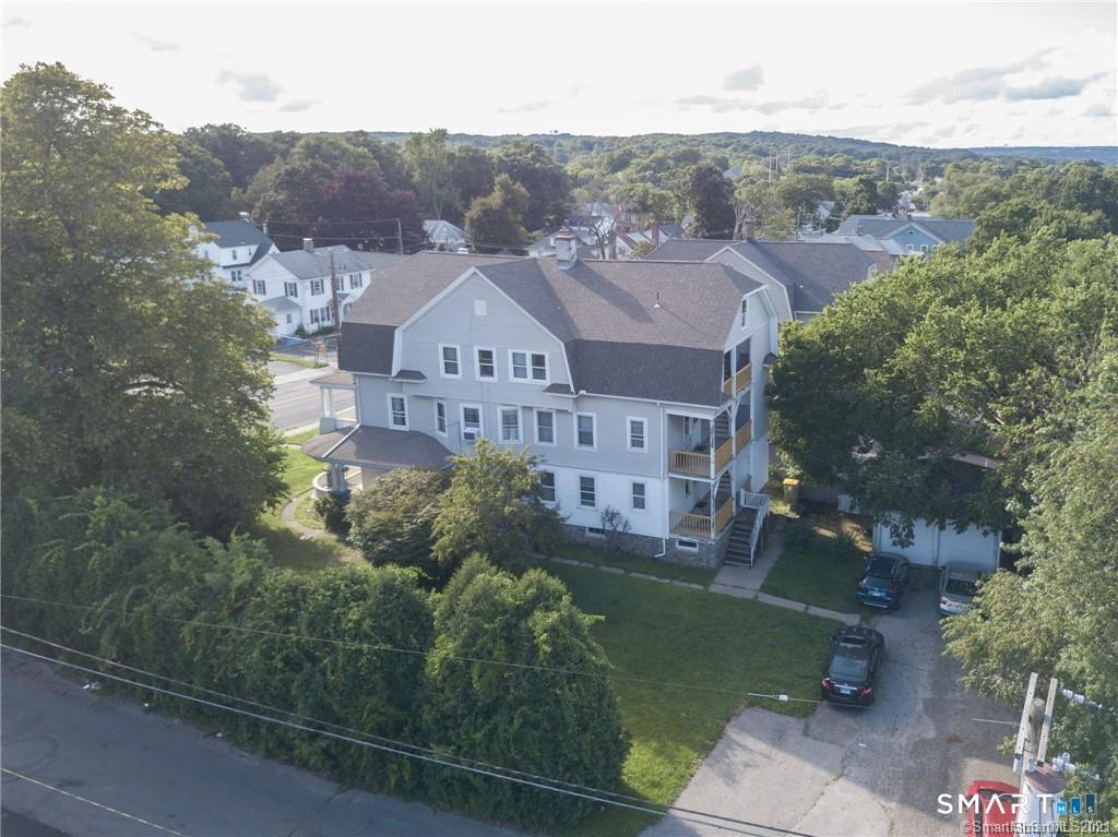 393 Highland Avenue, Unit 2 Waterbury, CT 06708 - Photo 10 of 10 an aerial view of a house with a garden