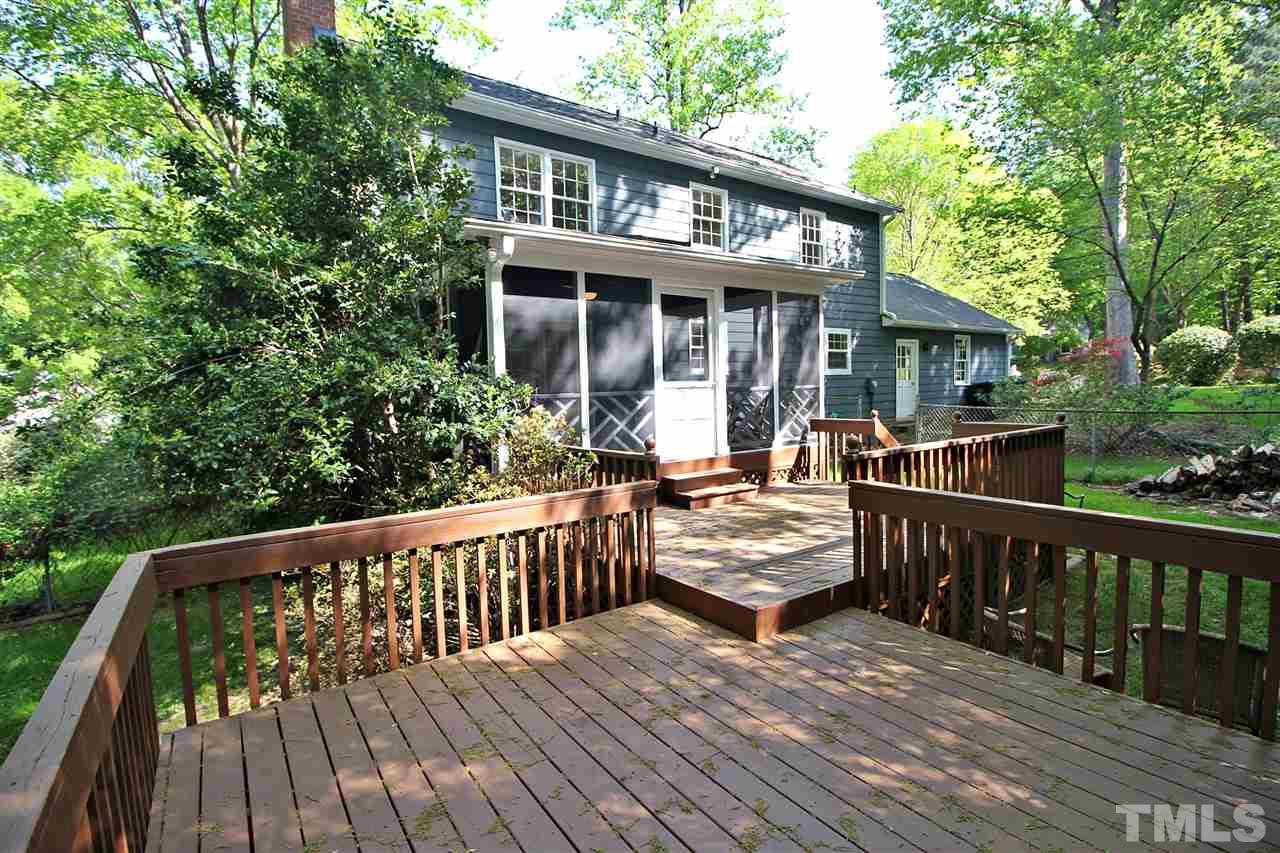 5512 Mapleridge Road Raleigh, NC 27609 - Photo 22 of 23 a view of house with deck outdoor seating and wooden floor