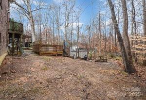 836 Brookfield Circle Salisbury, NC 28146 - Photo 11 of 42 a view of outdoor space with deck and tree