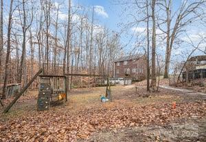 836 Brookfield Circle Salisbury, NC 28146 - Photo 12 of 42 a view of yard with trees in the background