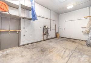 836 Brookfield Circle Salisbury, NC 28146 - Photo 16 of 42 a view of a room with racks on the wall