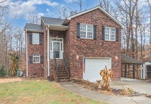 836 Brookfield Circle Salisbury, NC 28146 - Photo 2 of 42 a front view of a house with garden
