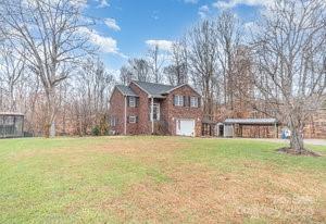 836 Brookfield Circle Salisbury, NC 28146 - Photo 5 of 42 a front view of residential houses with yard and trees