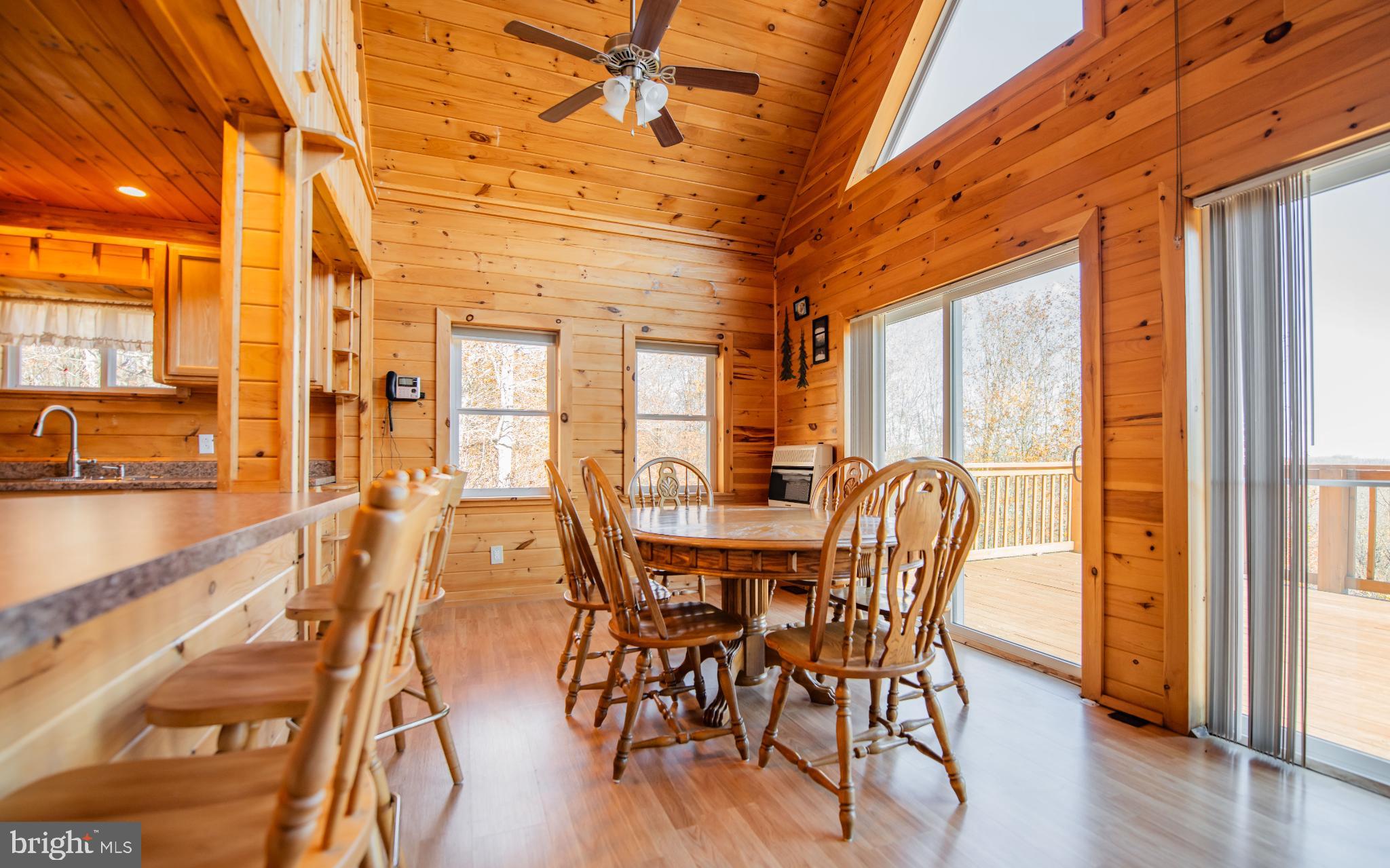 115 Glory Rdg Road Shunk, PA 17768 - Photo 7 of 35 Cozy cabin dining with scenic views.