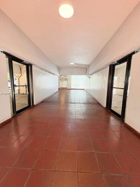 505 Northeast 30th Street, Unit 506 Miami, FL 33137 - Photo 24 of 26 a view of an empty room with a window