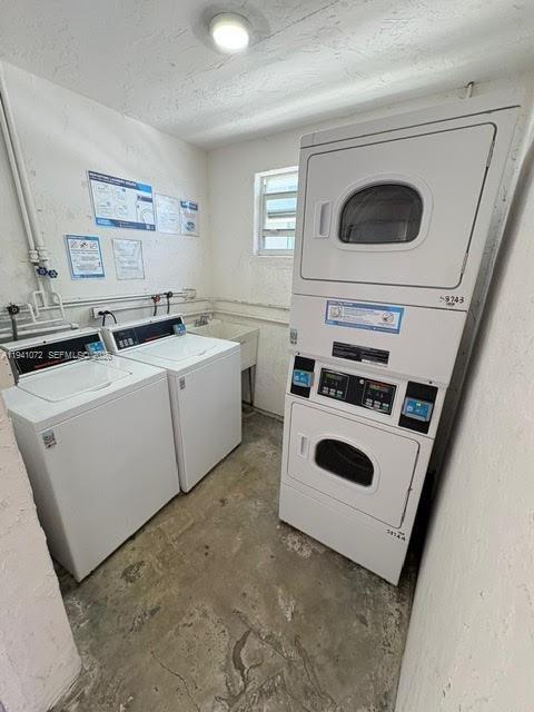 505 Northeast 30th Street, Unit 506 Miami, FL 33137 - Photo 26 of 26 a utility room with dryer and washer