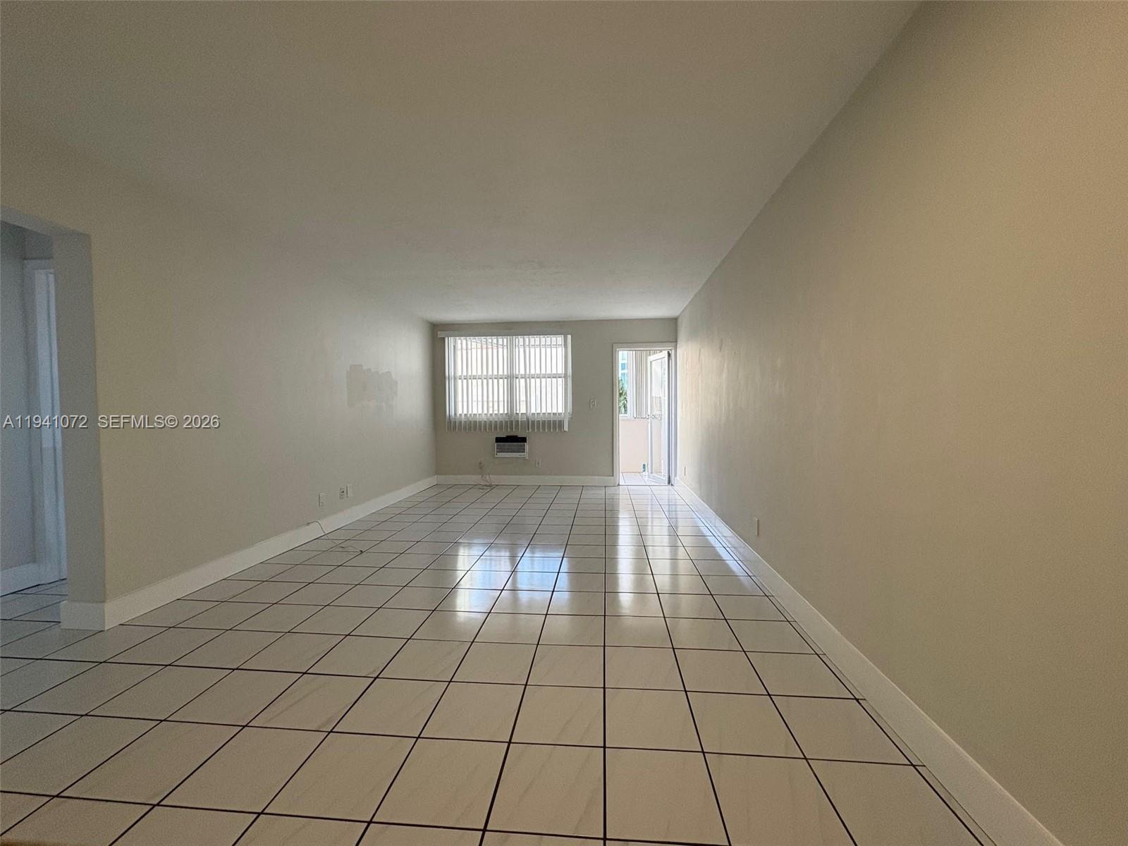 505 Northeast 30th Street, Unit 506 Miami, FL 33137 - Photo 8 of 26 a view of an empty room and window