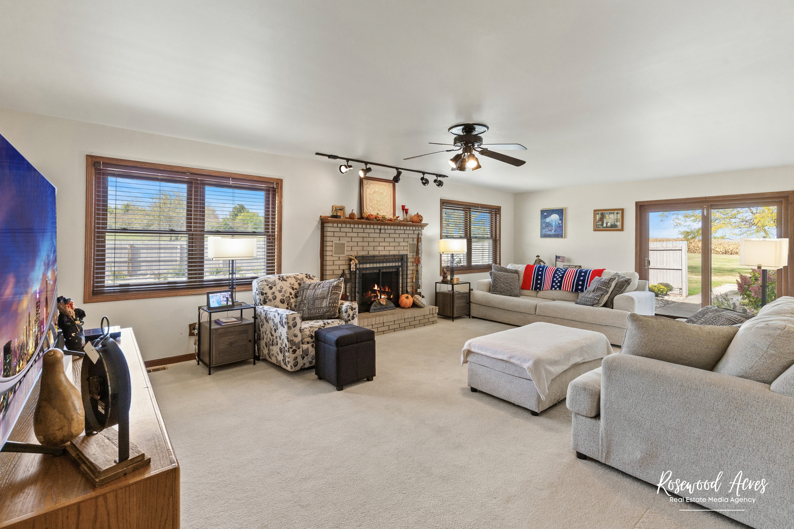 4196 North 2250W Road Bourbonnais, IL 60914 - Photo 13 of 61 a living room with furniture large window and flat screen tv