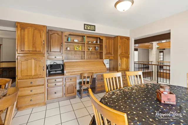 a kitchen with stainless steel appliances granite countertop a stove and a refrigerator