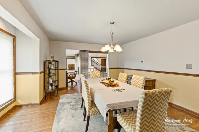 a bathroom with a sink a toilet and shower curtain