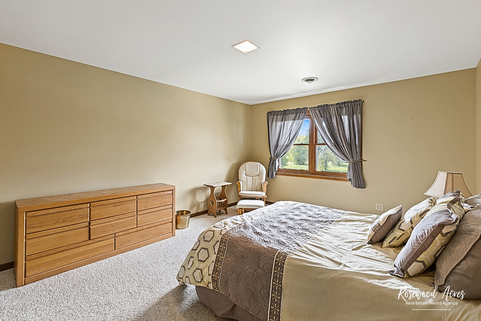 4196 North 2250W Road Bourbonnais, IL 60914 - Photo 25 of 61 a bedroom with a bed and a dresser