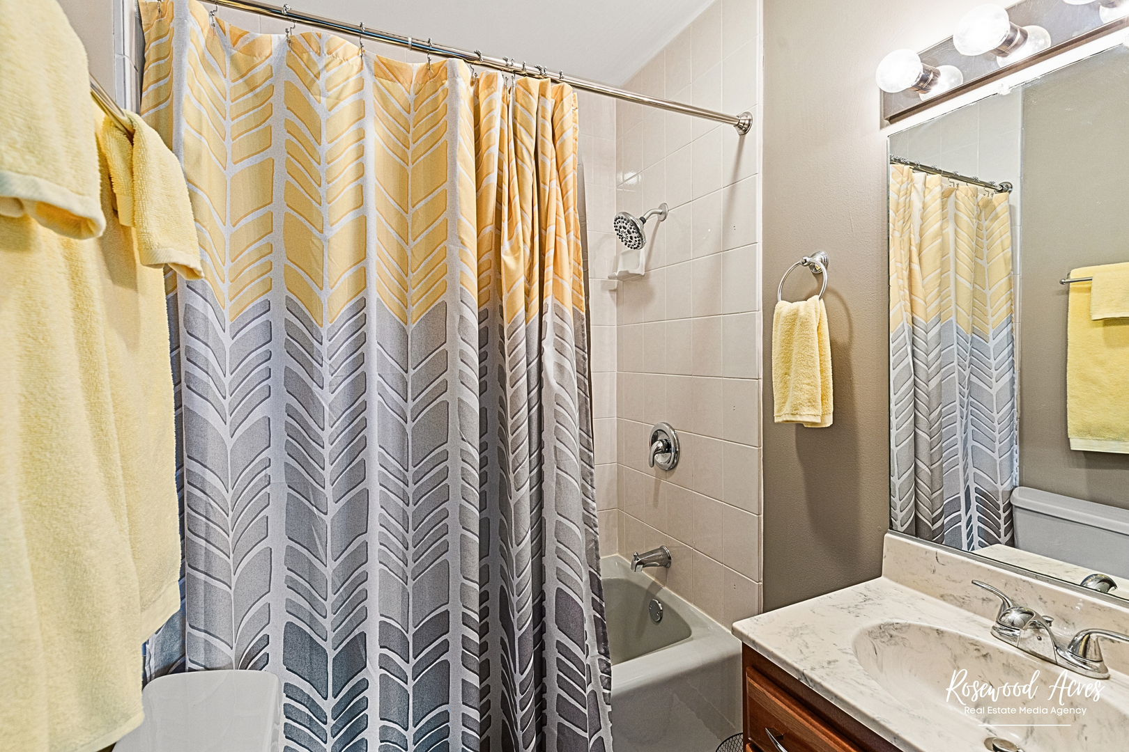 4196 North 2250W Road Bourbonnais, IL 60914 - Photo 27 of 61 a bathroom with a sink a toilet and shower curtain