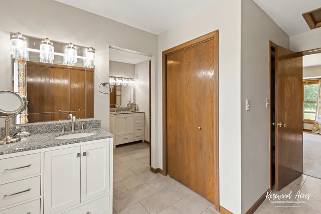 a bathroom with a bathtub and a sink