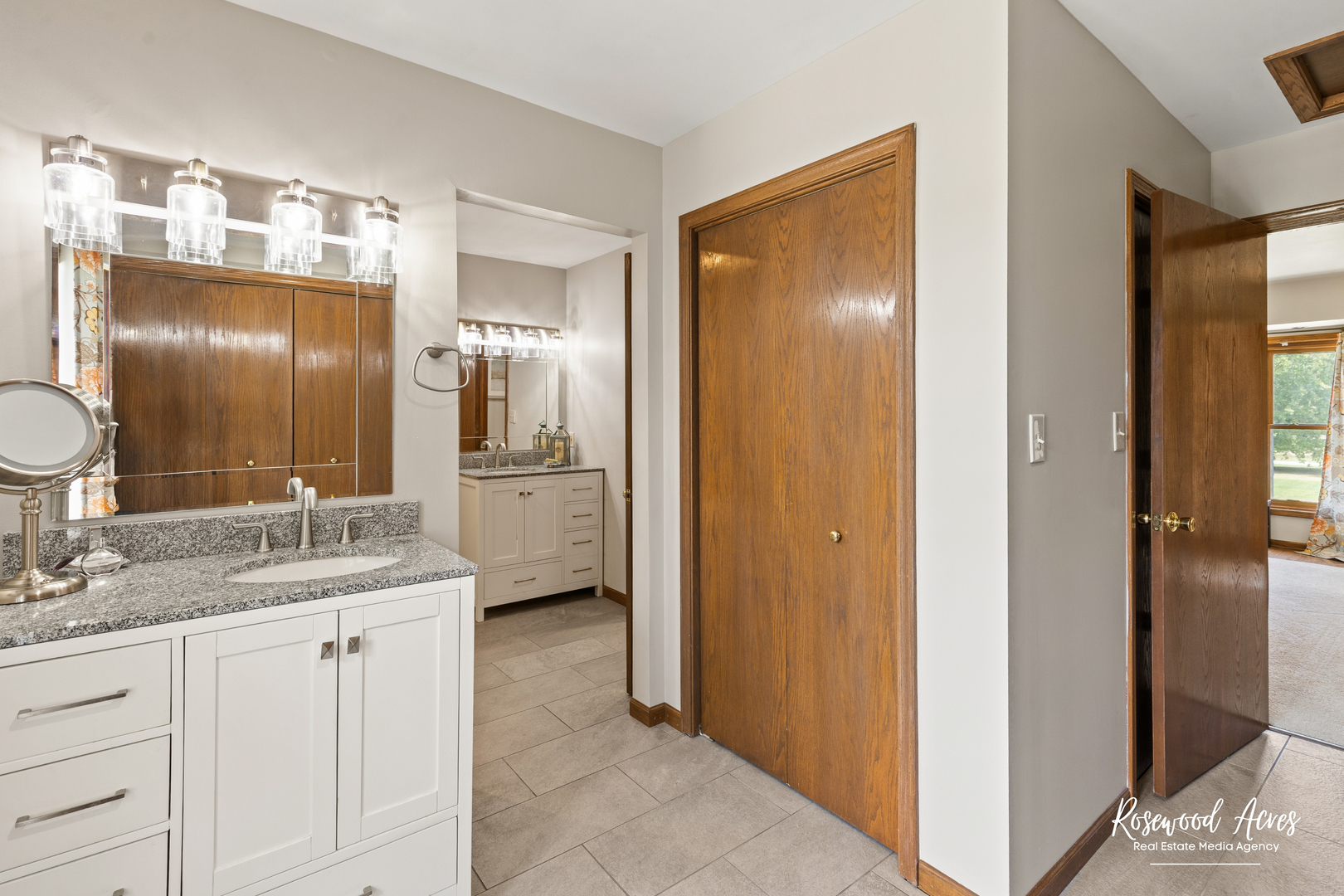 4196 North 2250W Road Bourbonnais, IL 60914 - Photo 34 of 61 a bathroom with a double vanity sink and a mirror