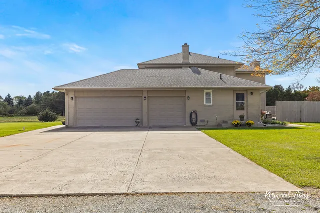 a front view of a house with yard