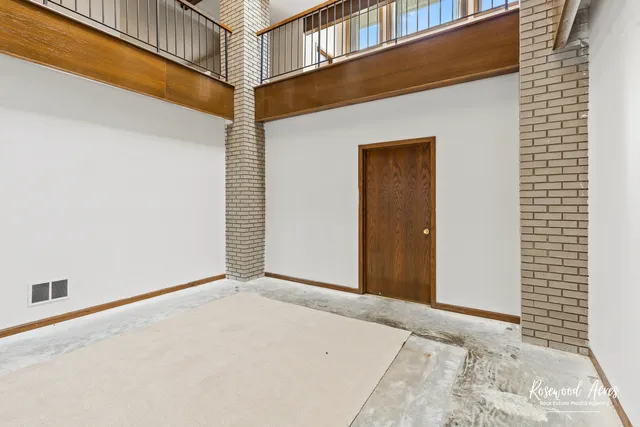 a view of a swimming pool with an outdoor seating