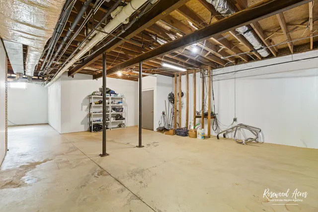 a view of a house with swimming pool and sitting area