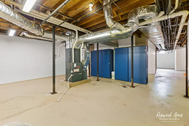 a picture of a bathroom with a shower