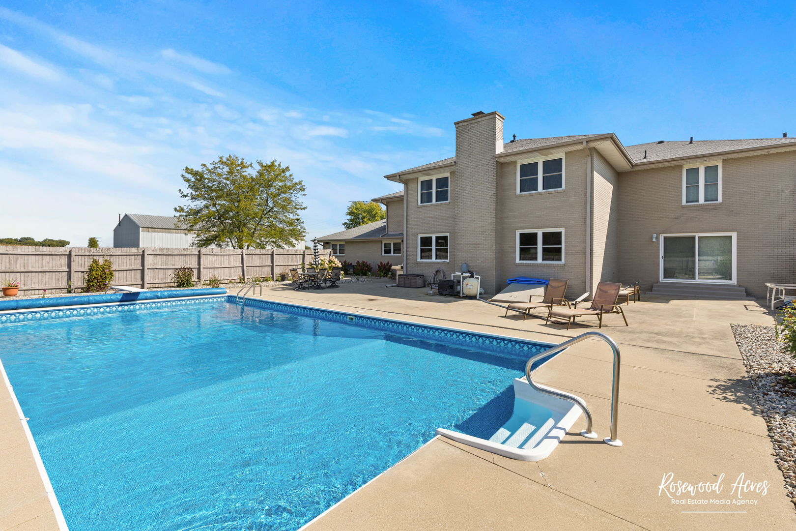 4196 North 2250W Road Bourbonnais, IL 60914 - Photo 52 of 61 a view of a swimming pool with a lounge chairs