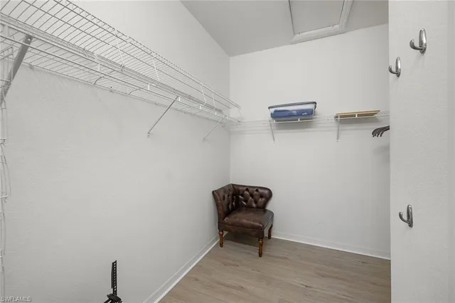 a view of room with racks on the wall