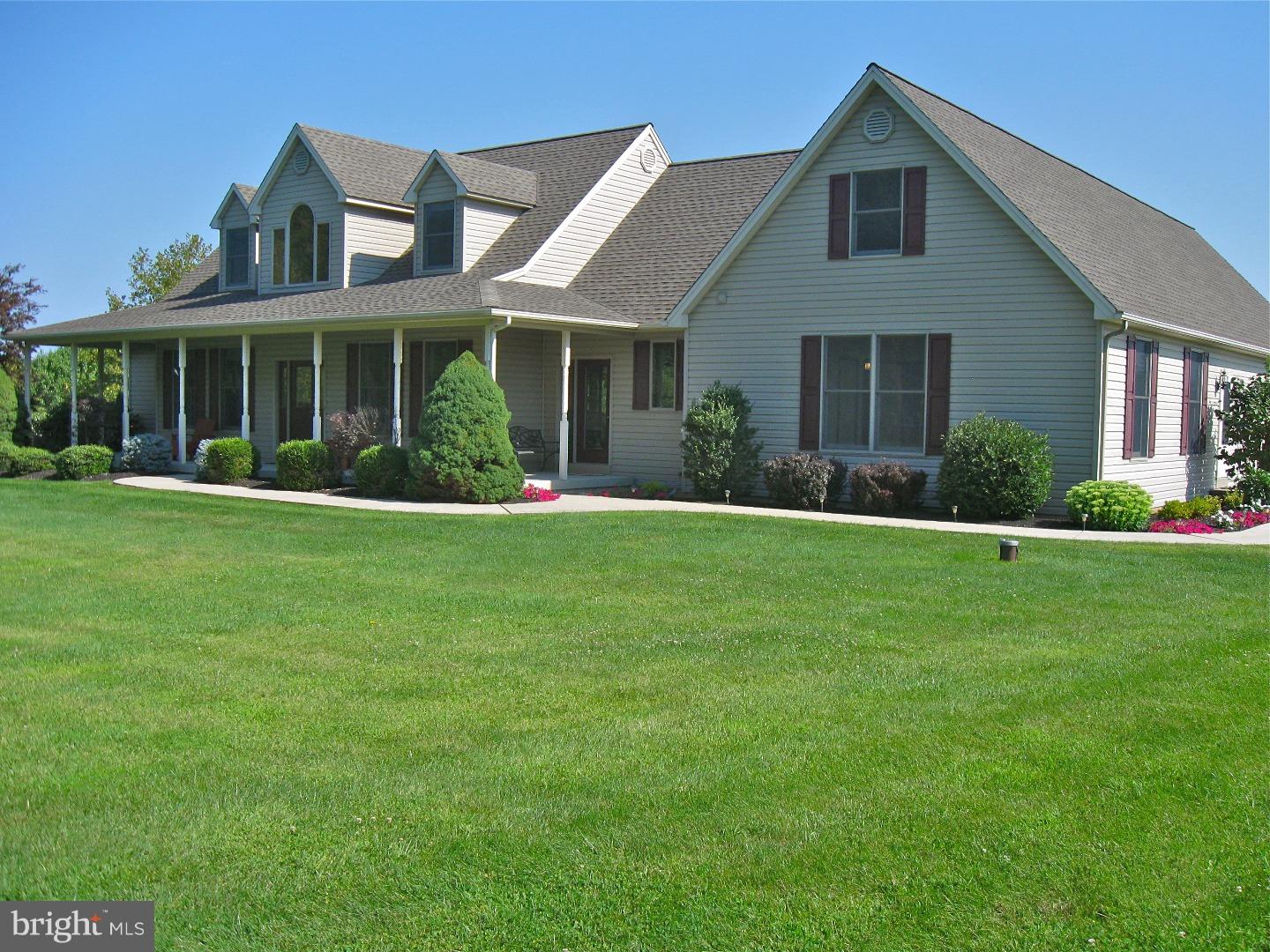 1011 Bucks Road Perkasie, PA 18944 - Photo 1 of 25 a front view of a house with a yard