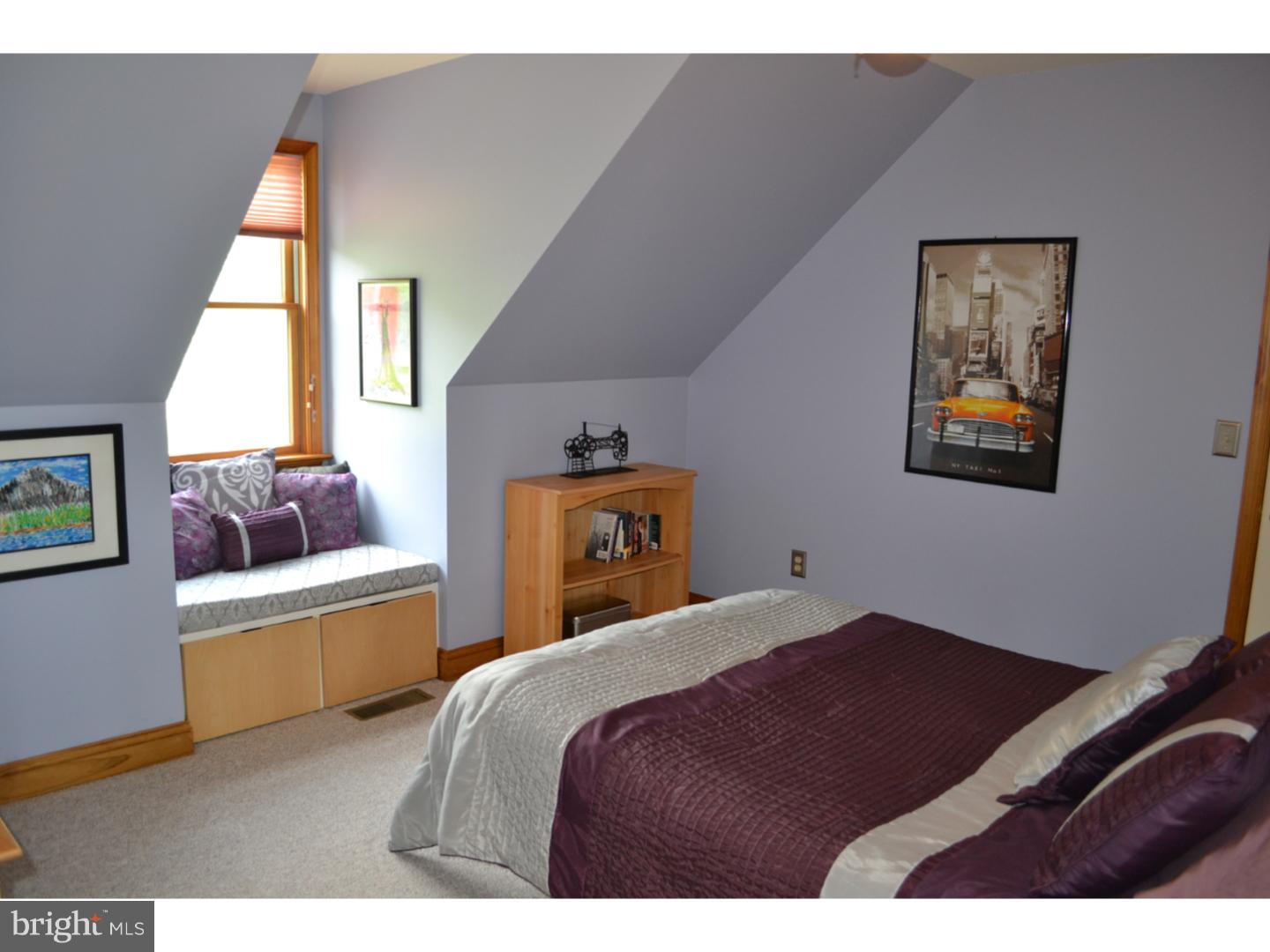 1011 Bucks Road Perkasie, PA 18944 - Photo 11 of 25 a bedroom with a bed and a couch