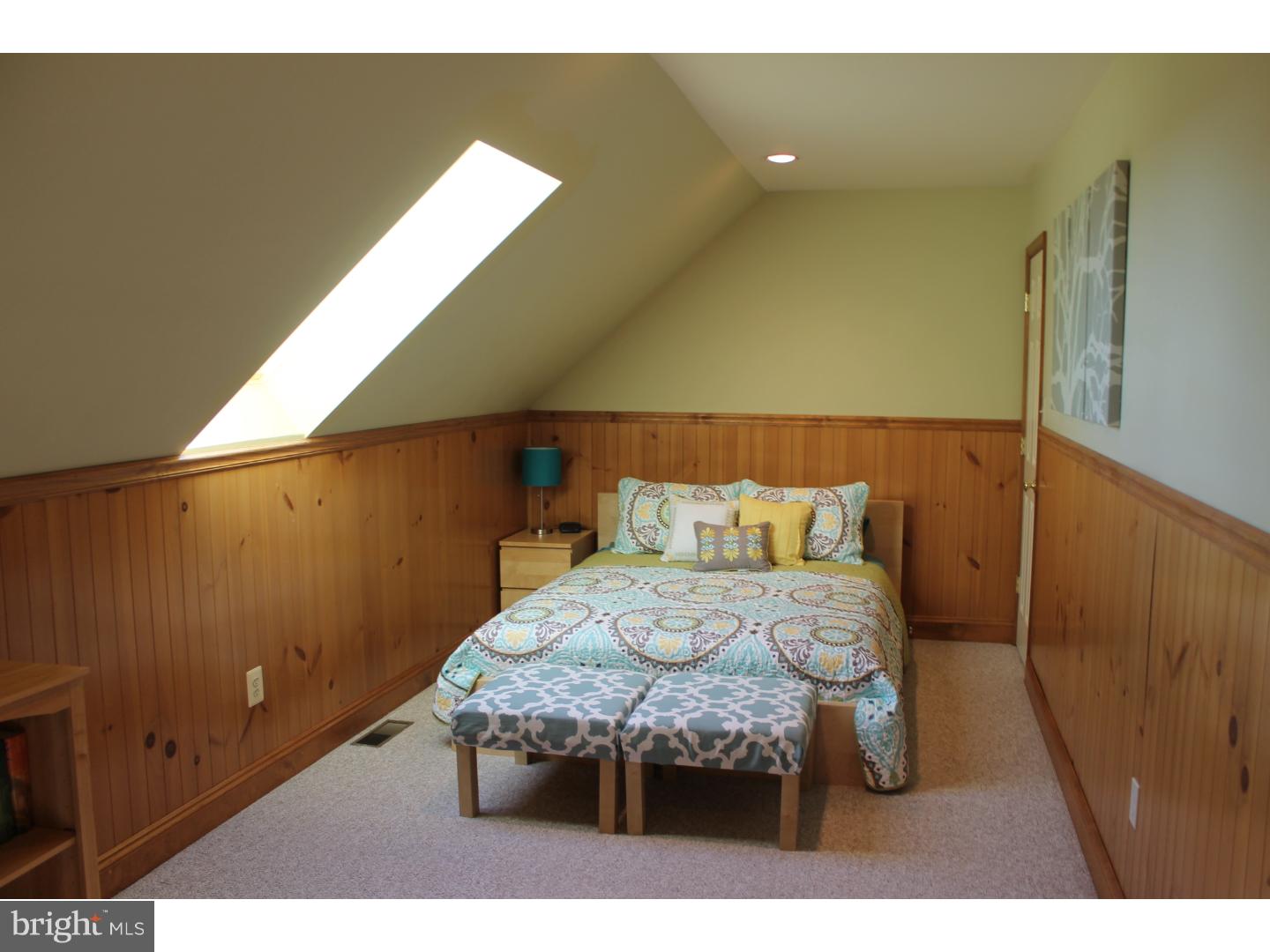 1011 Bucks Road Perkasie, PA 18944 - Photo 13 of 25 a bed sitting in a bedroom next to a window