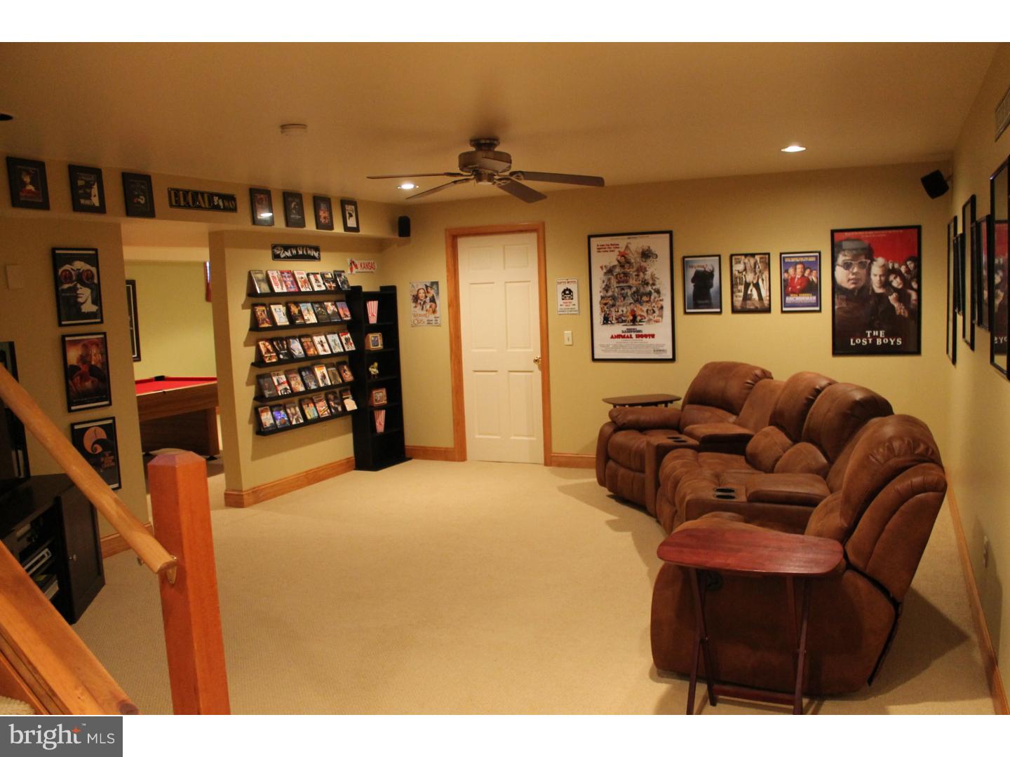 1011 Bucks Road Perkasie, PA 18944 - Photo 14 of 25 a living room with furniture a ceiling fan and a window