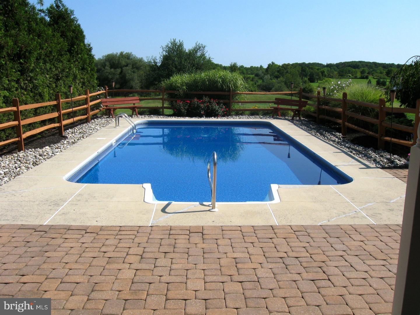 1011 Bucks Road Perkasie, PA 18944 - Photo 23 of 25 a view of a swimming pool with a yard