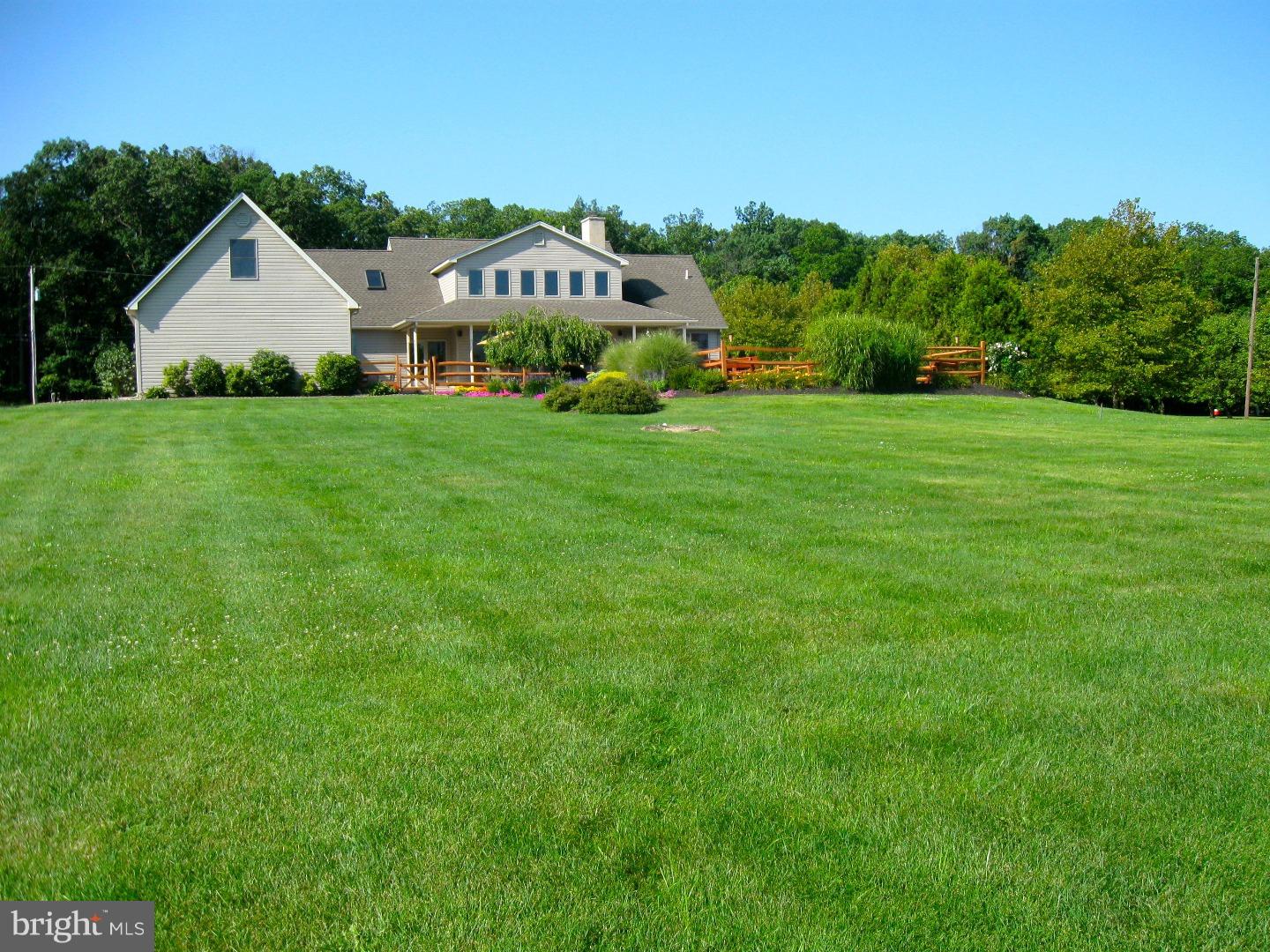 1011 Bucks Road Perkasie, PA 18944 - Photo 24 of 25 a front view of a house with garden