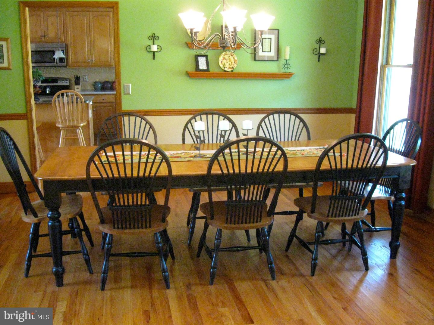 1011 Bucks Road Perkasie, PA 18944 - Photo 5 of 25 a view of a dining room with furniture and wooden floor