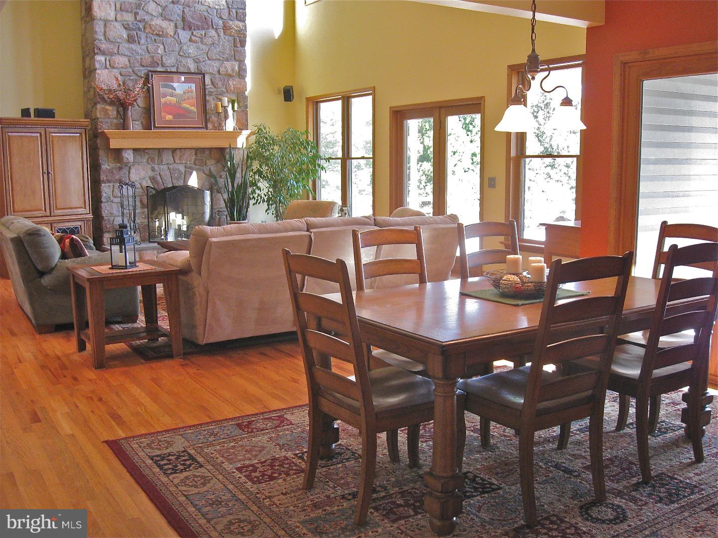 1011 Bucks Road Perkasie, PA 18944 - Photo 6 of 25 a view of a dining room with furniture window and wooden floor