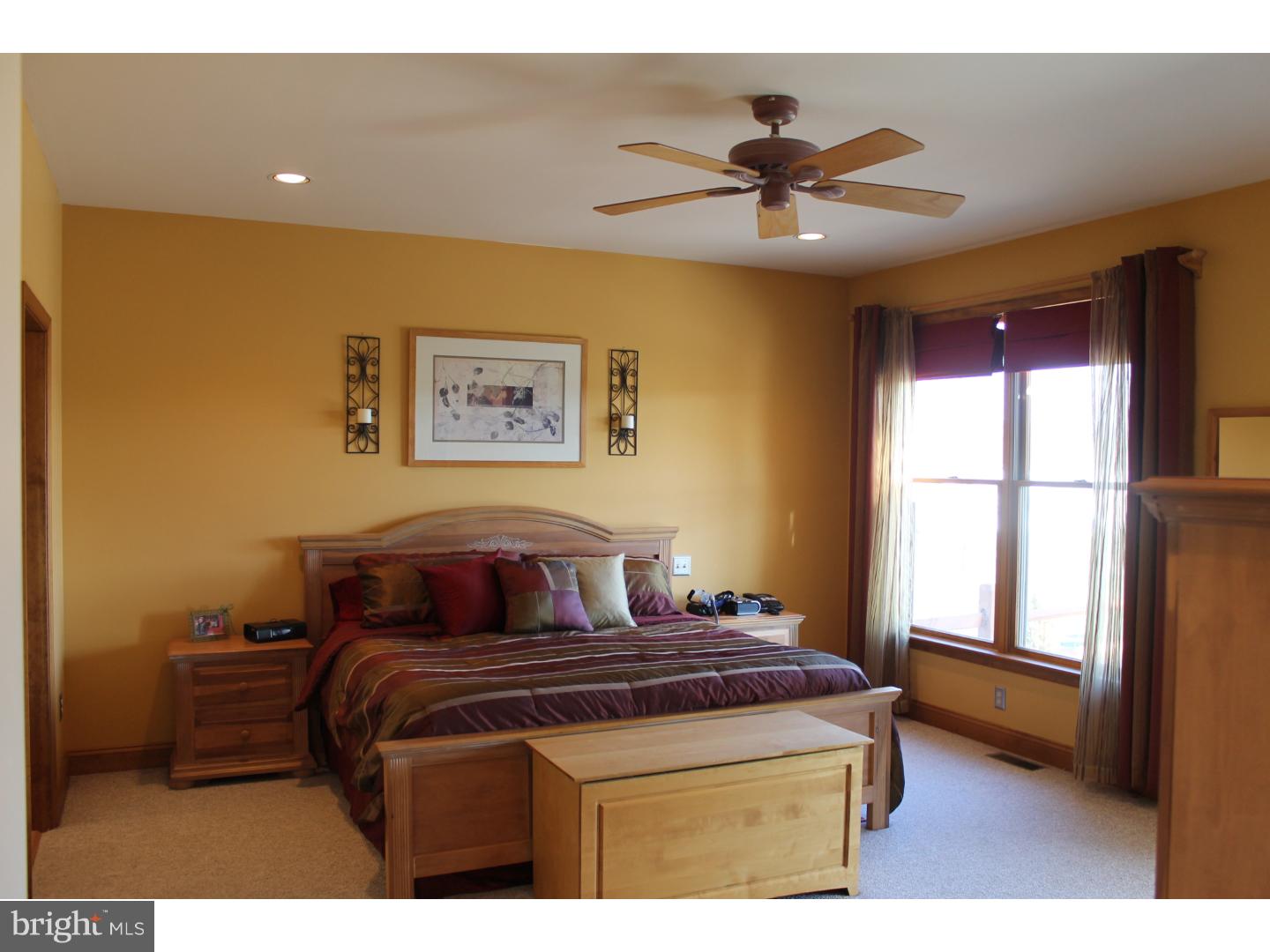 1011 Bucks Road Perkasie, PA 18944 - Photo 10 of 25 a bedroom with a bed and a window