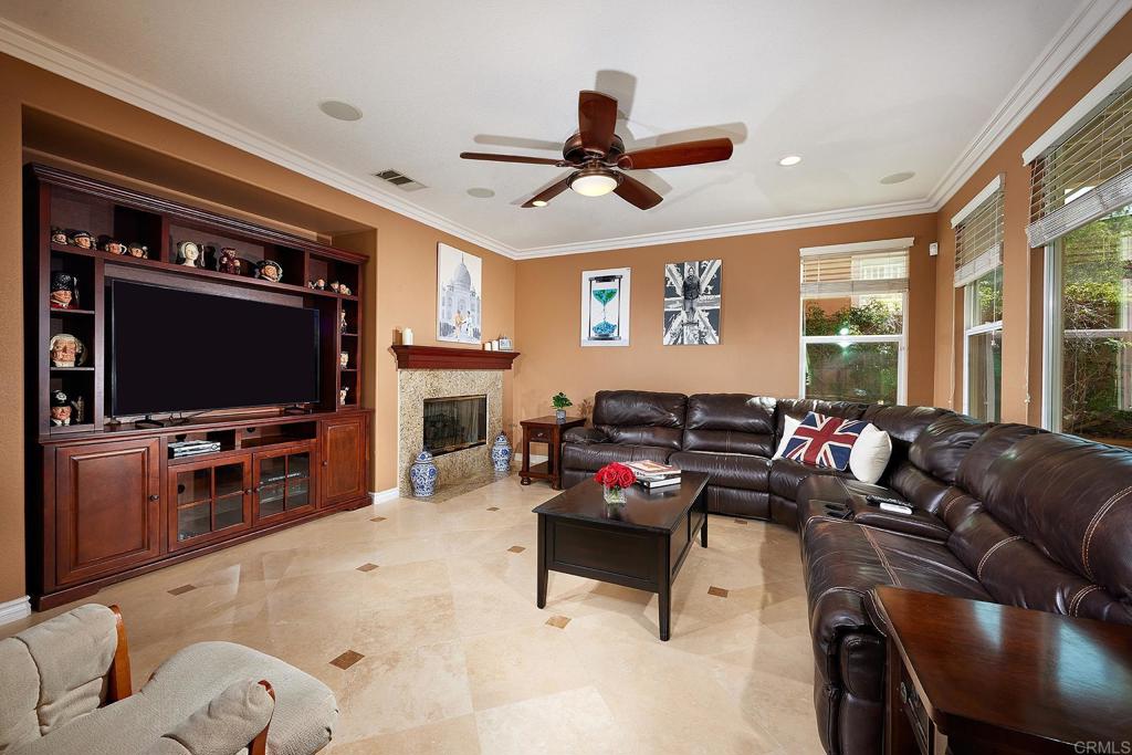 962 Baylor Drive San Marcos, CA 92078 - Photo 12 of 40 a living room with furniture and a flat screen tv