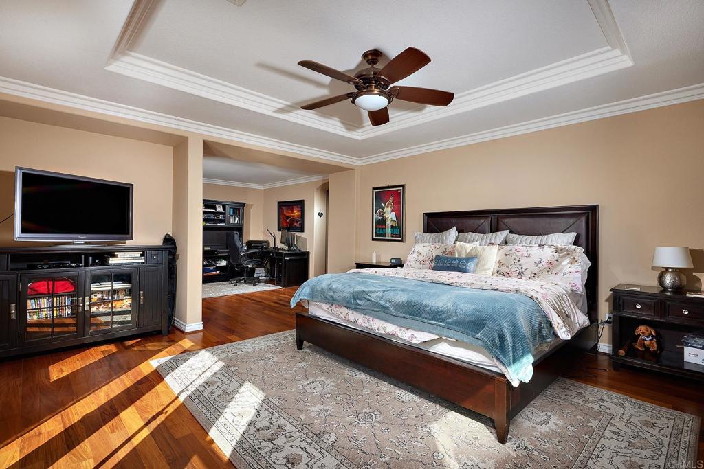 962 Baylor Drive San Marcos, CA 92078 - Photo 18 of 40 a bedroom with a bed and a flat screen tv with the dresser