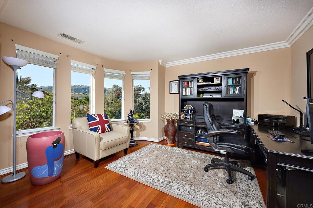 962 Baylor Drive San Marcos, CA 92078 - Photo 19 of 40 a bedroom with bed and large windows