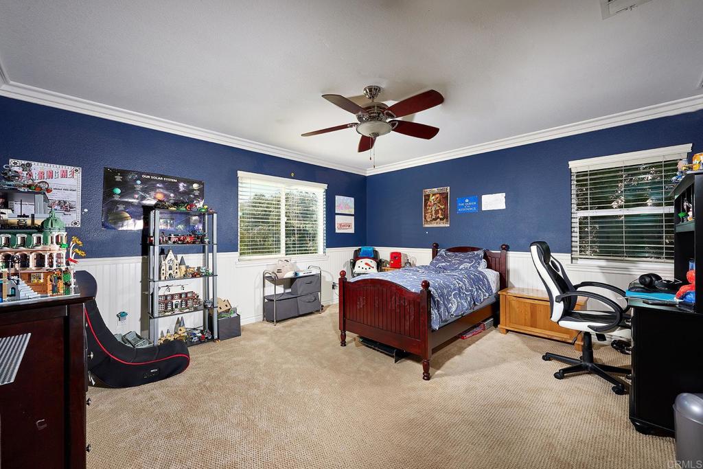 962 Baylor Drive San Marcos, CA 92078 - Photo 25 of 40 a bed room with furniture and a window