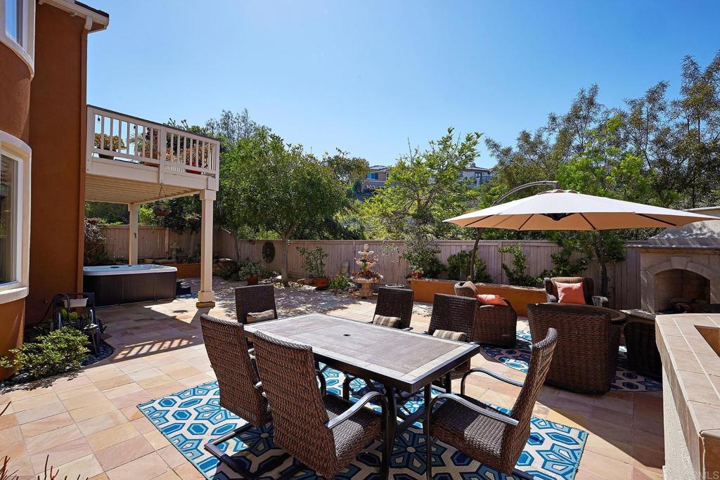 962 Baylor Drive San Marcos, CA 92078 - Photo 30 of 40 a backyard of a house with table and chairs