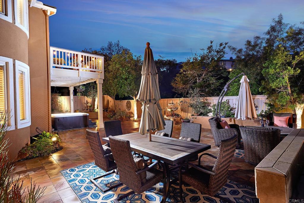 962 Baylor Drive San Marcos, CA 92078 - Photo 40 of 40 a view of a patio with table and chairs and potted plants