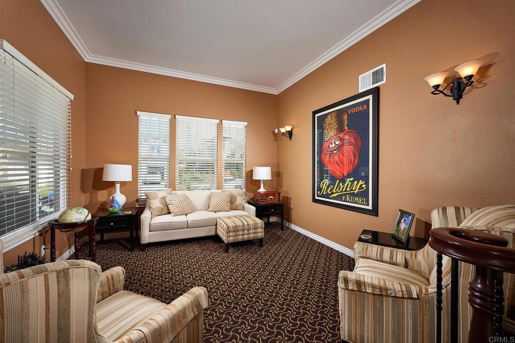 962 Baylor Drive San Marcos, CA 92078 - Photo 5 of 40 a living room with furniture and a large window