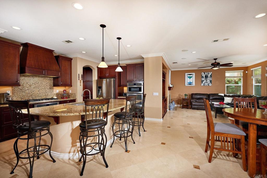 962 Baylor Drive San Marcos, CA 92078 - Photo 9 of 40 a view of a dining room with furniture