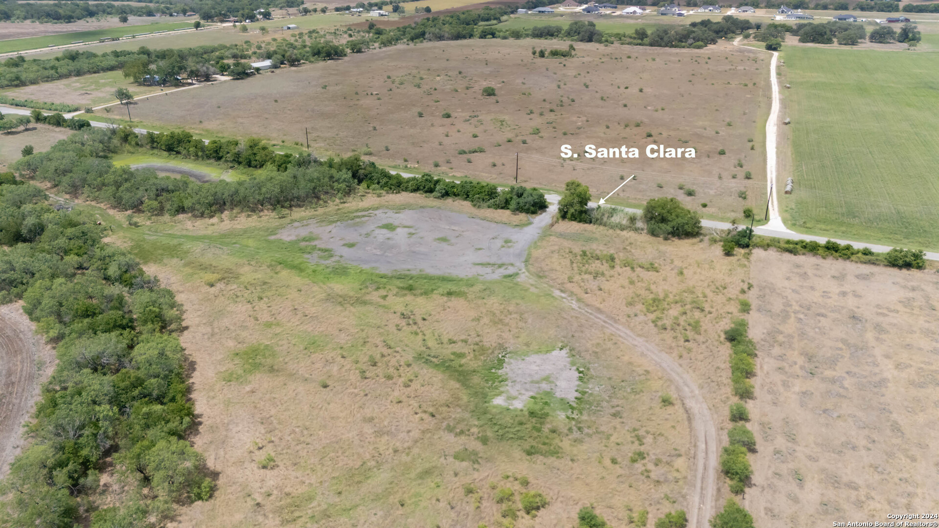 Tbd Santa Clara Road Seguin, TX 78155 - Photo 21 of 23 a view of a dry yard with wooden fence