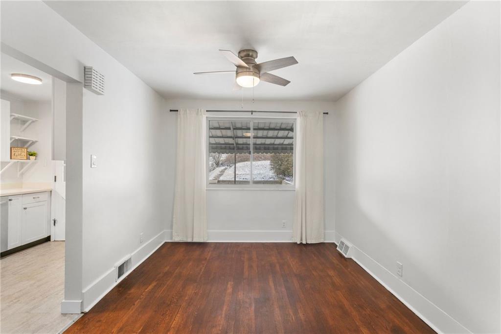 4227 Lydia Street Pittsburgh, PA 15207 - Photo 12 of 44 wooden floor in an empty room with a window