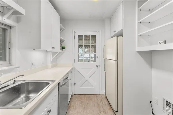 a view of kitchen and utility room