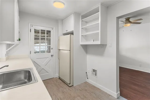 a kitchen with a sink and a cabinets