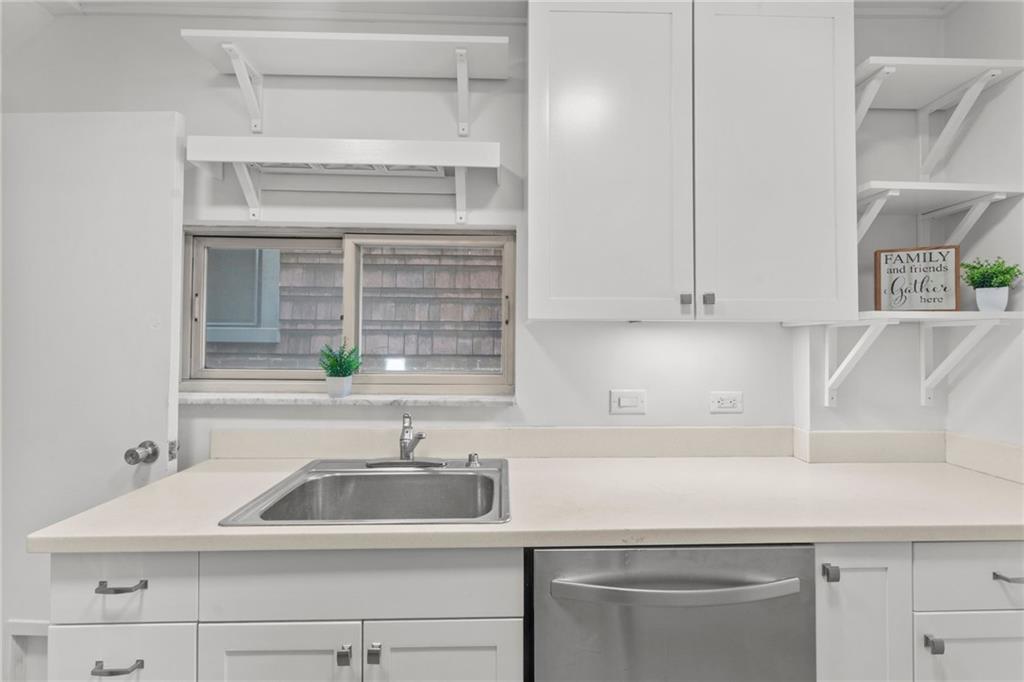 4227 Lydia Street Pittsburgh, PA 15207 - Photo 20 of 44 a kitchen with a sink and a cabinets