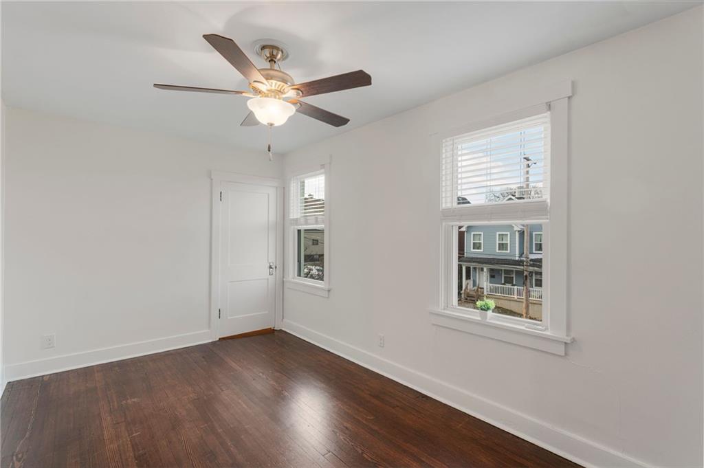 4227 Lydia Street Pittsburgh, PA 15207 - Photo 24 of 44 a view of wooden floor and windows in a room