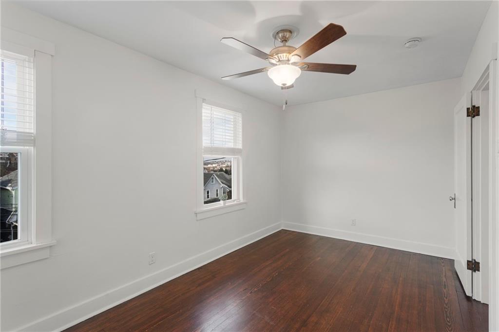 4227 Lydia Street Pittsburgh, PA 15207 - Photo 26 of 44 wooden floor in an empty room with a window