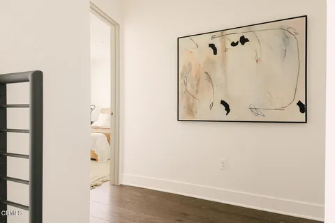 a view of door with wooden floor